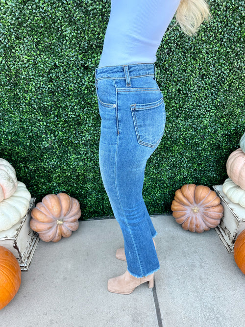 Mid Rise Raw Hem Straight Jeans